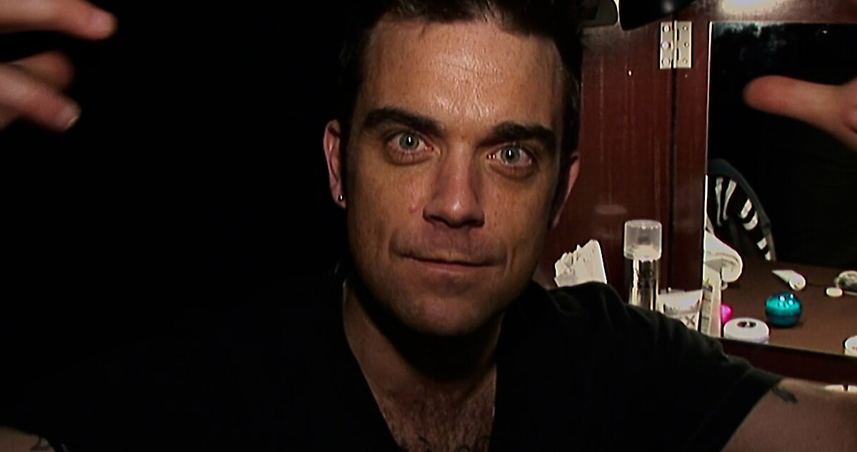 Découvrez l’intimité scandaleuse de Robbie Williams, l’homme qui fait la Une des journaux, dans ce documentaire choc !